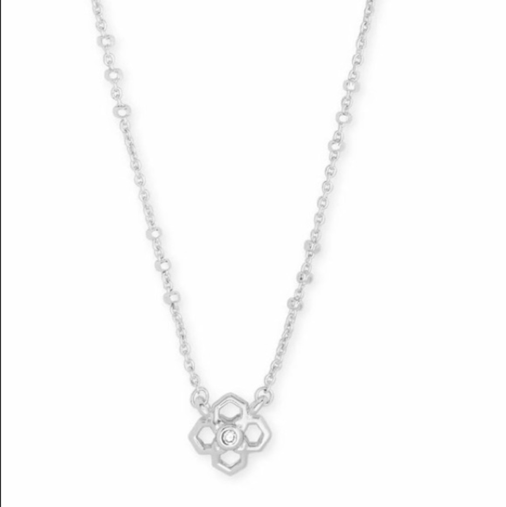 Kendra Scott silver rue earrings and necklace